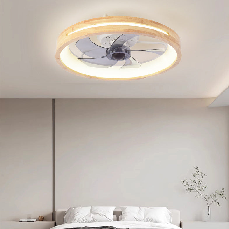 Wood ceiling fan light lit, seen from below