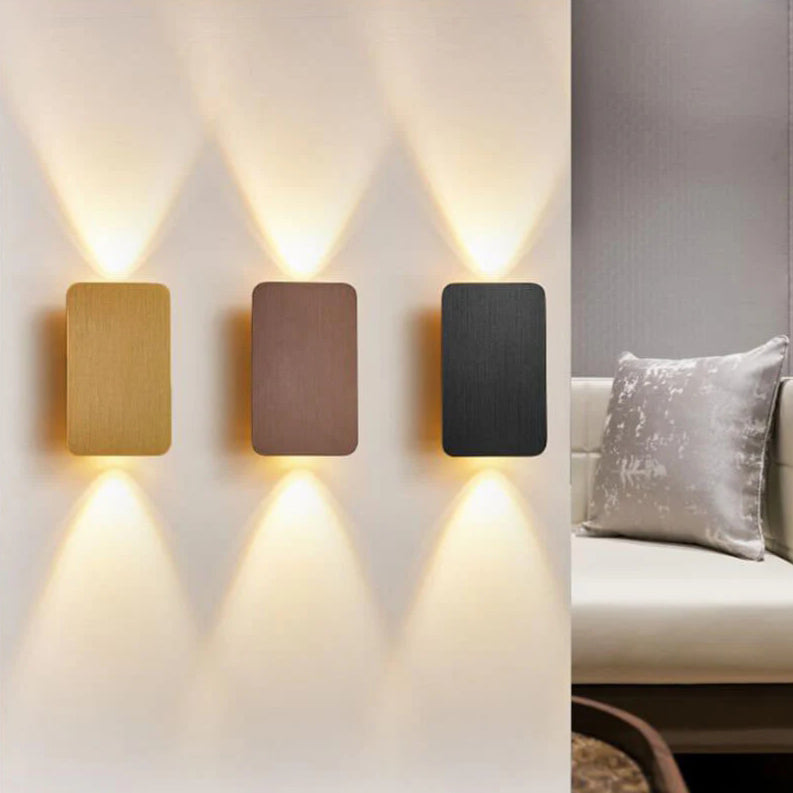 Flat panel LED wall light lit on a wall