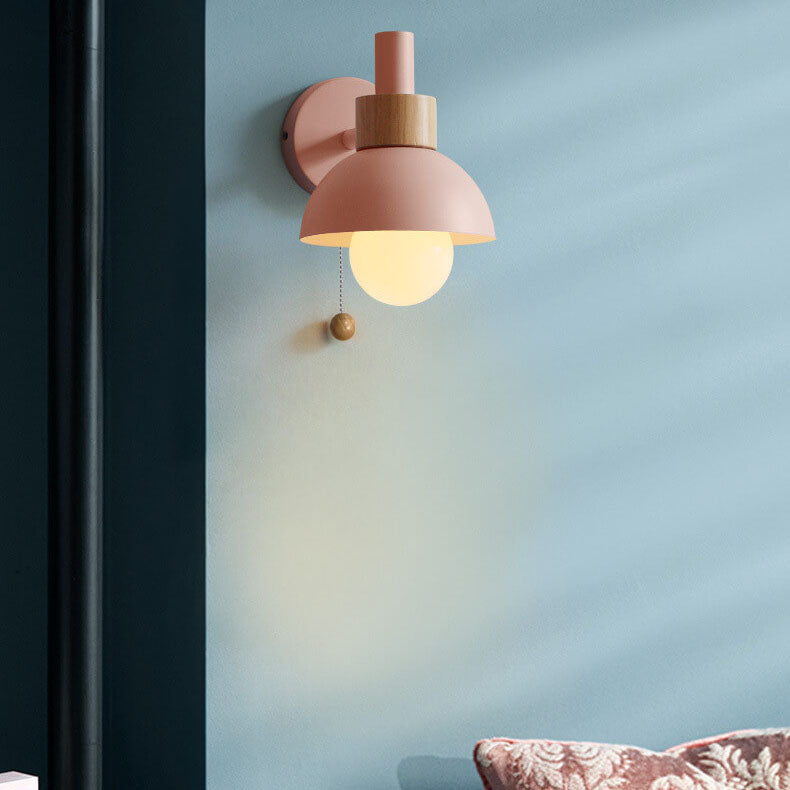 Macaron globe wall light in berry pink, front