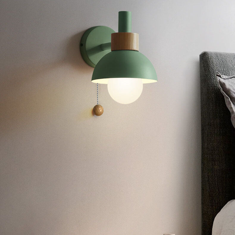Macaron globe wall light in mustard green
