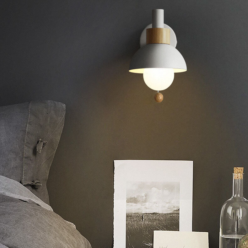 Macaron globe wall light lit