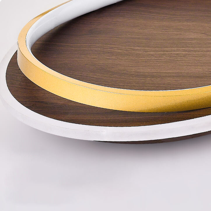 Walnut grain ceiling light rim detail