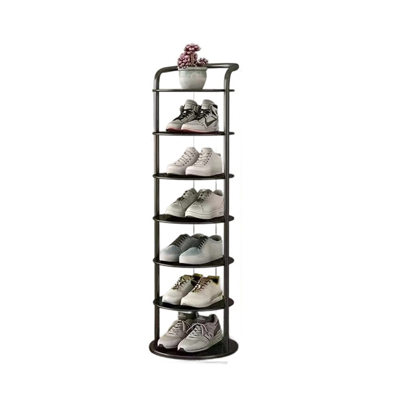 Round shoe rack holding shoes