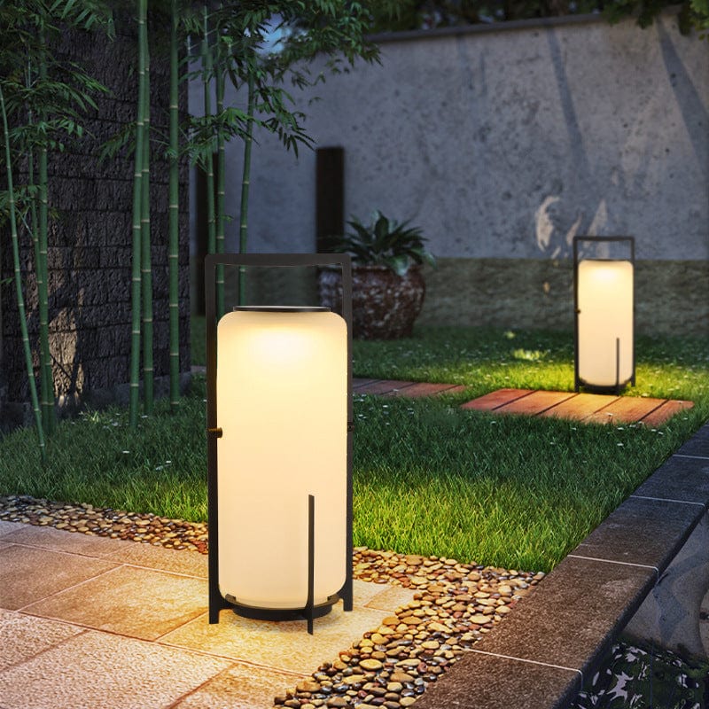 Solar terrace lantern lit at dusk
