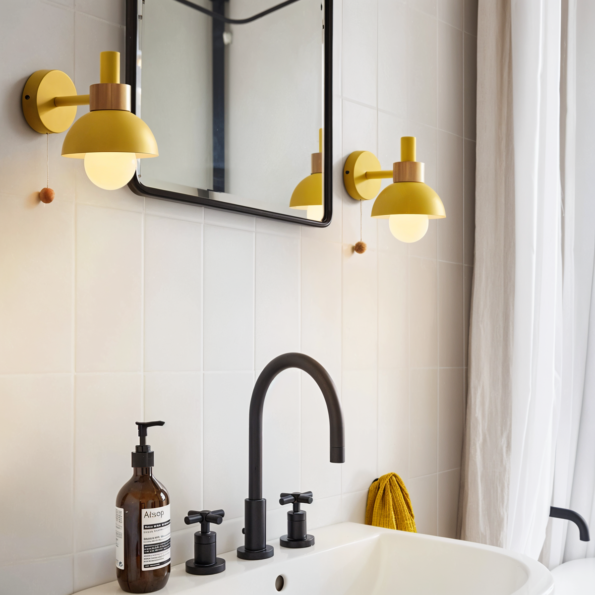 Wall lamp close-up showing wood arm