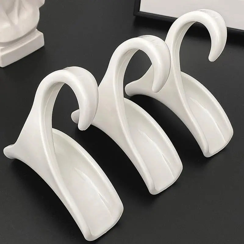 Bags organised on arched hangers