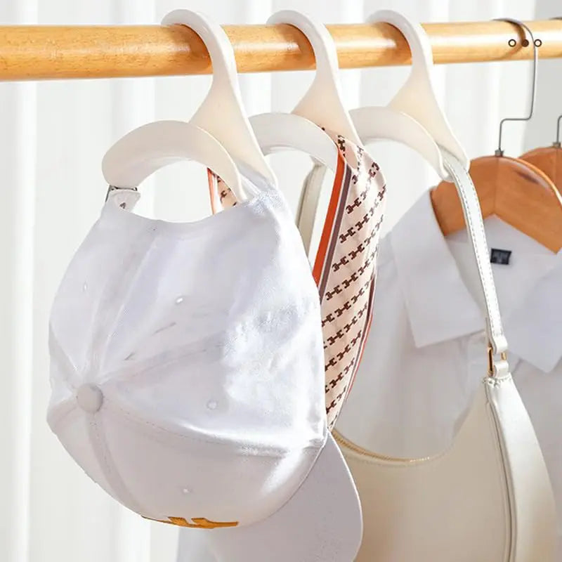 Handbag hanging from arched hook hanger