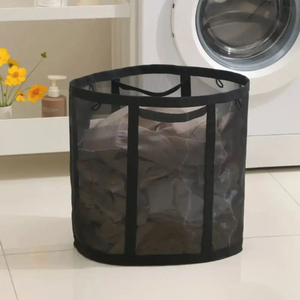 Laundry basket carried by its handles