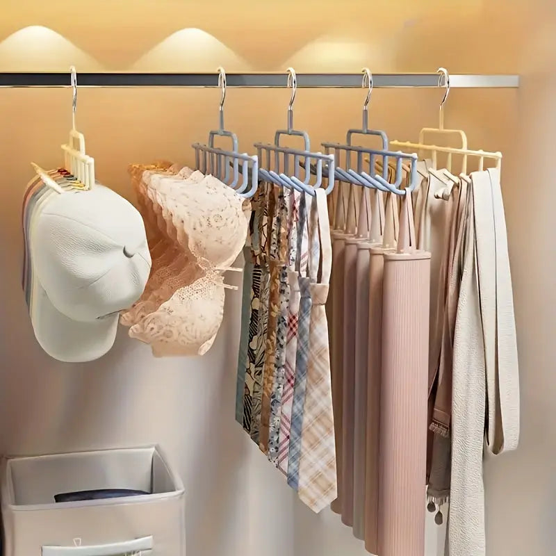 Rotating hooks on the wardrobe hanger