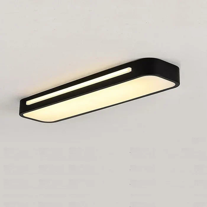 Linear LED ceiling light lit in a living room