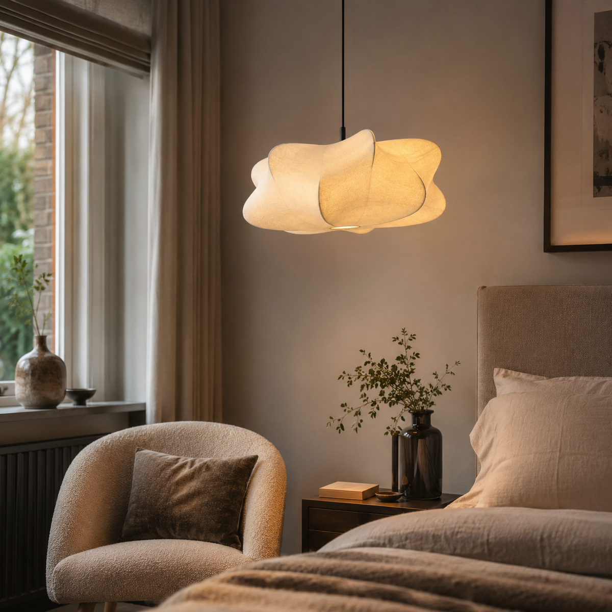 Silk pendant light lit in a hallway