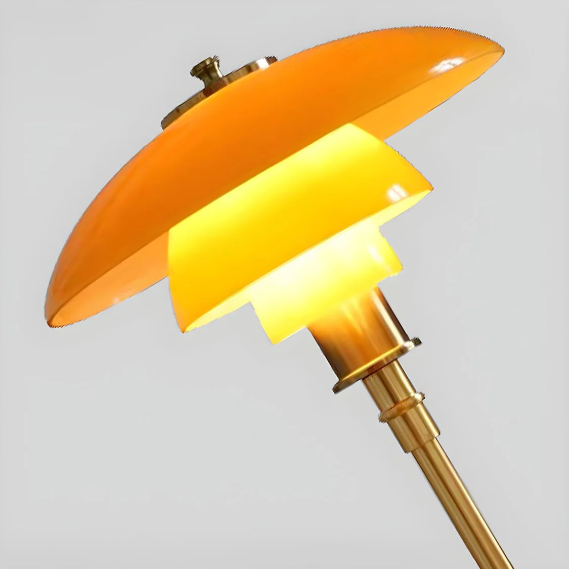Tiered glass table lamp features