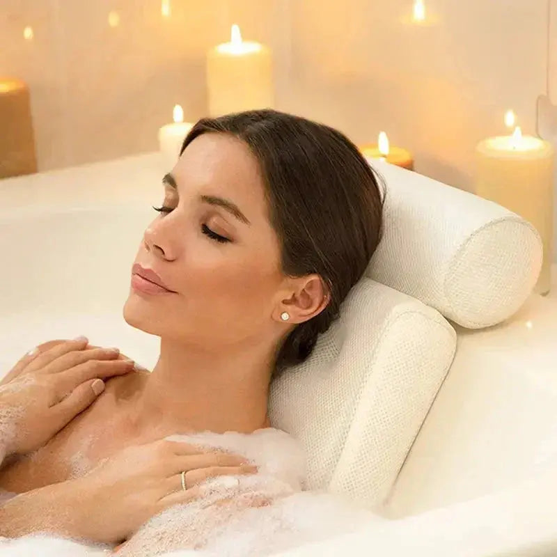 Bath pillow attached to tub wall