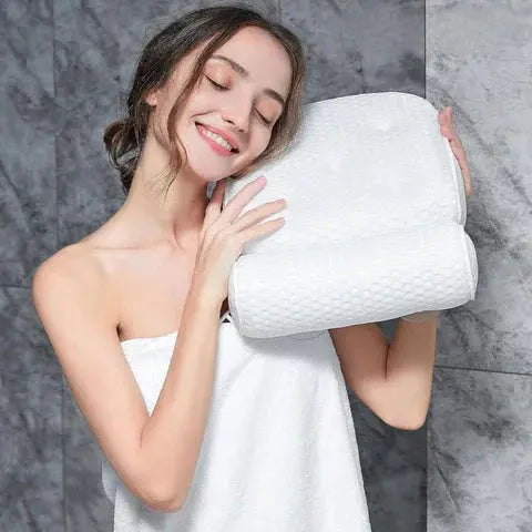Suction cups on back of bath pillow