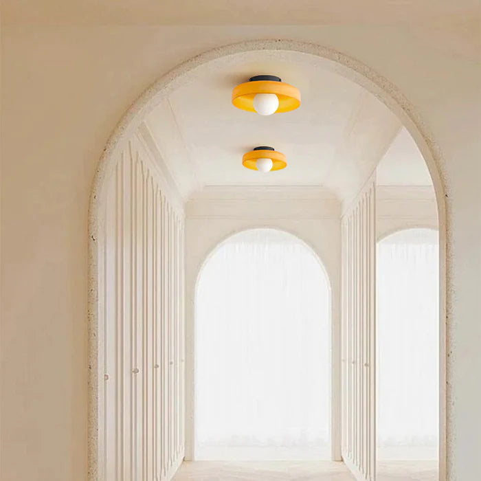 Coloured glass ceiling light in a hallway