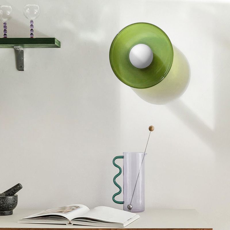White glass ceiling light lit