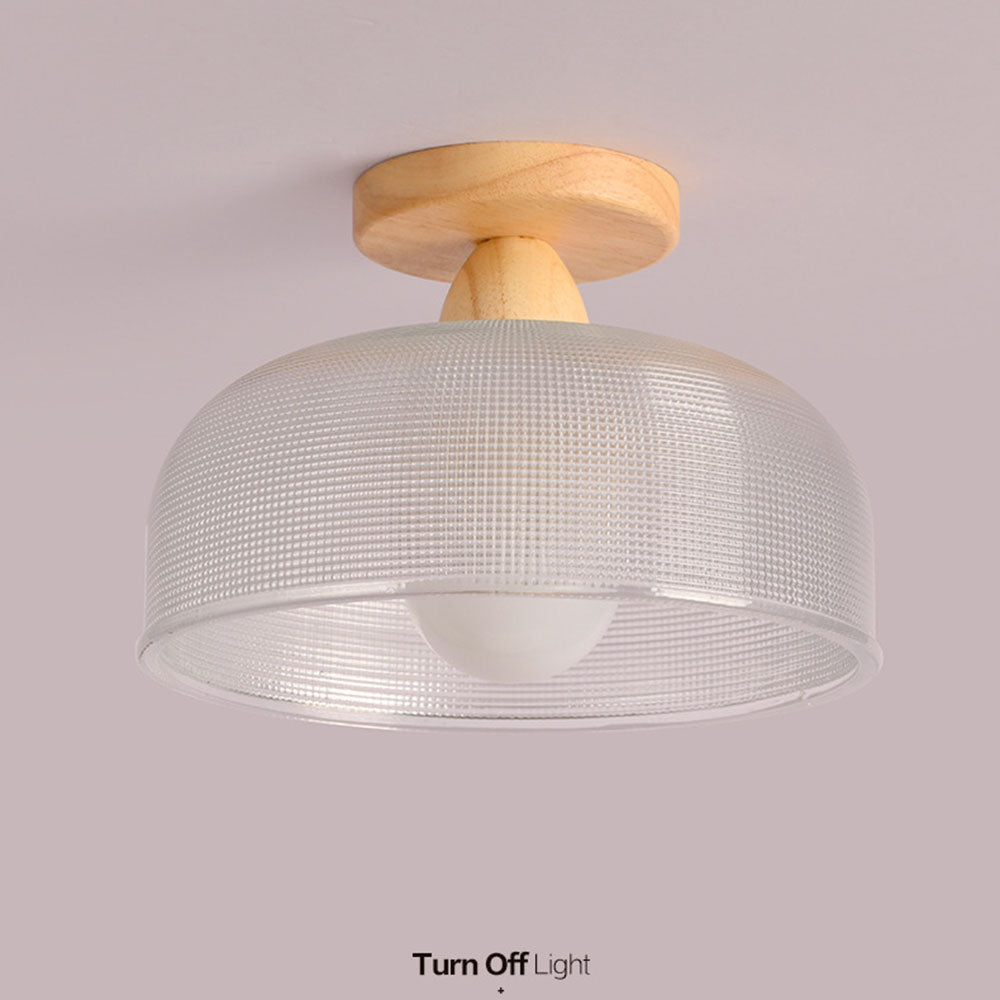 Ribbed glass ceiling light lit