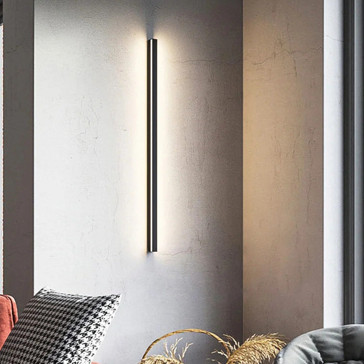 Wall light beside a mirror