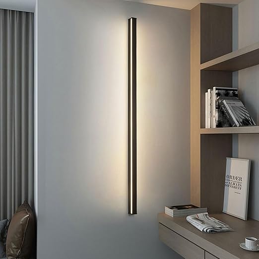 LED wall light above a bed