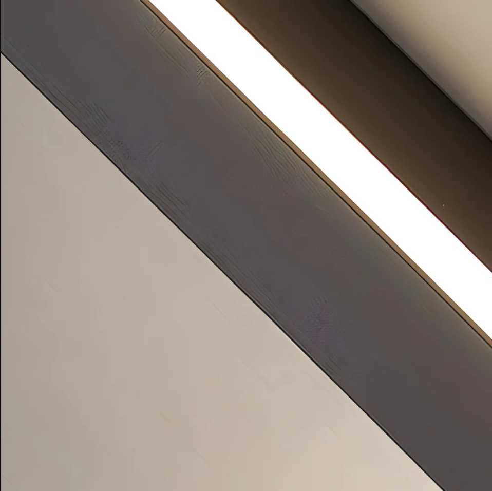 Linear LED wall light in a bedroom setting