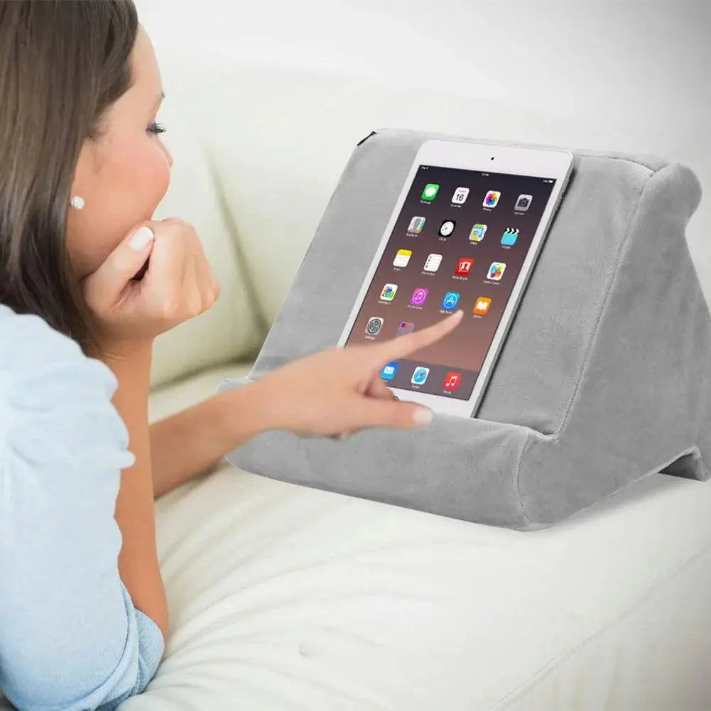 Tablet pillow stand on a bed