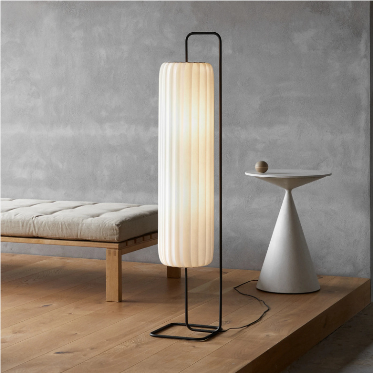 Japandi floor lamp styled next to an armchair