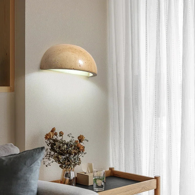 Travertine wall light glowing