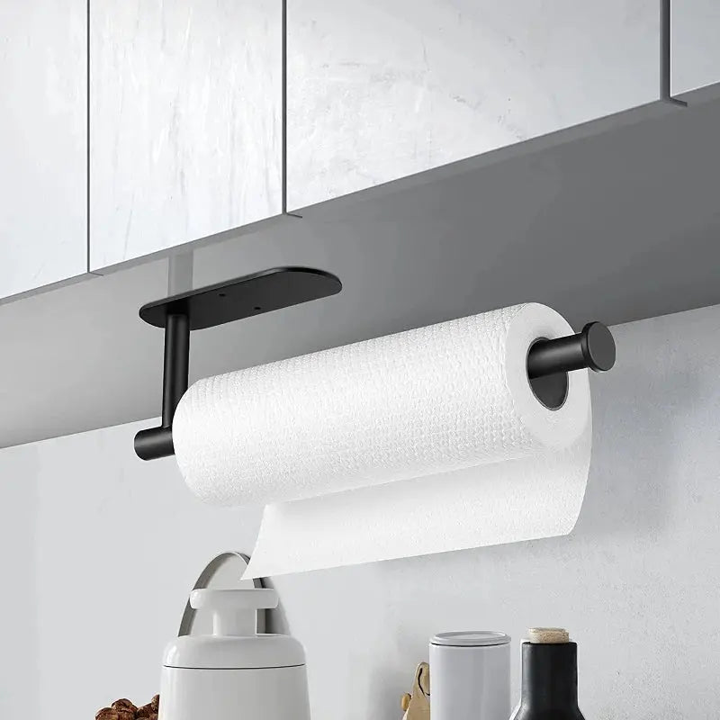 Adhesive paper towel holder in use on a kitchen wall