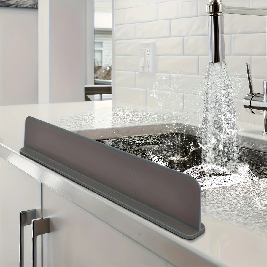 Silicone sink splash guard on a kitchen sink