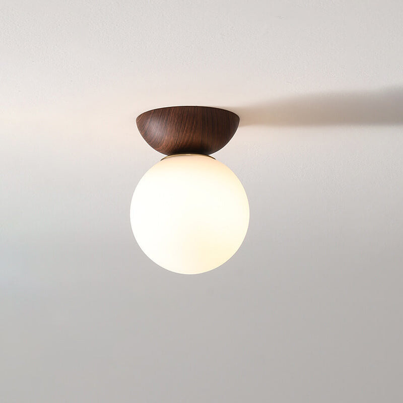 Semi-flush glass orb light in walnut finish