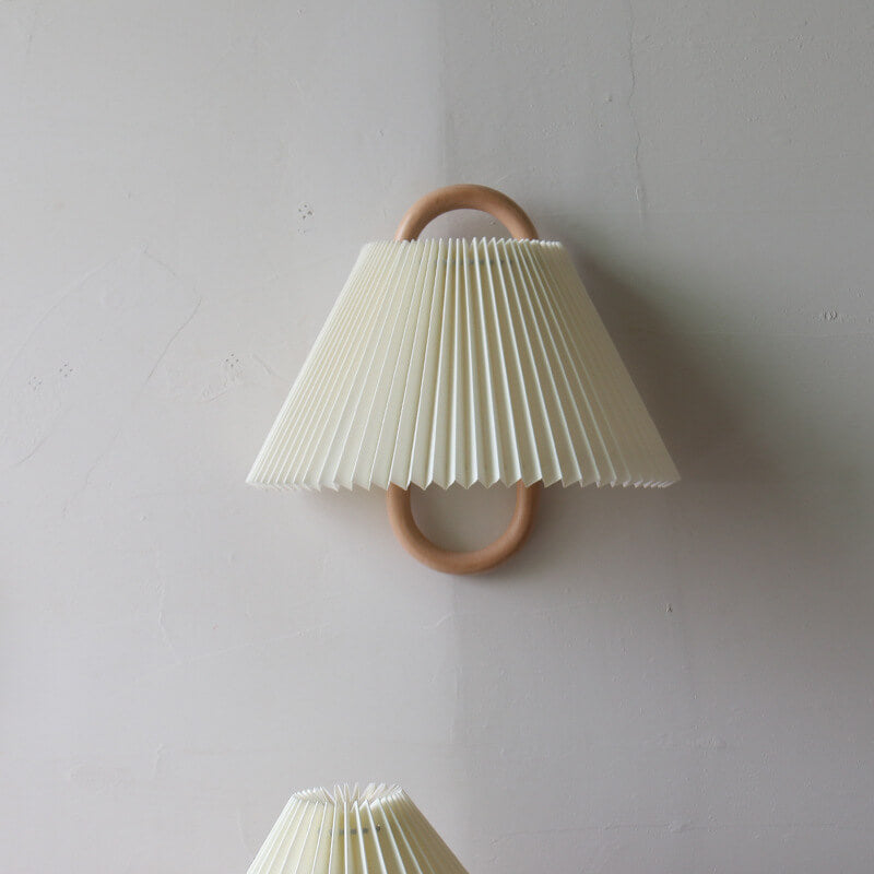 Beige pleated half-moon wall light