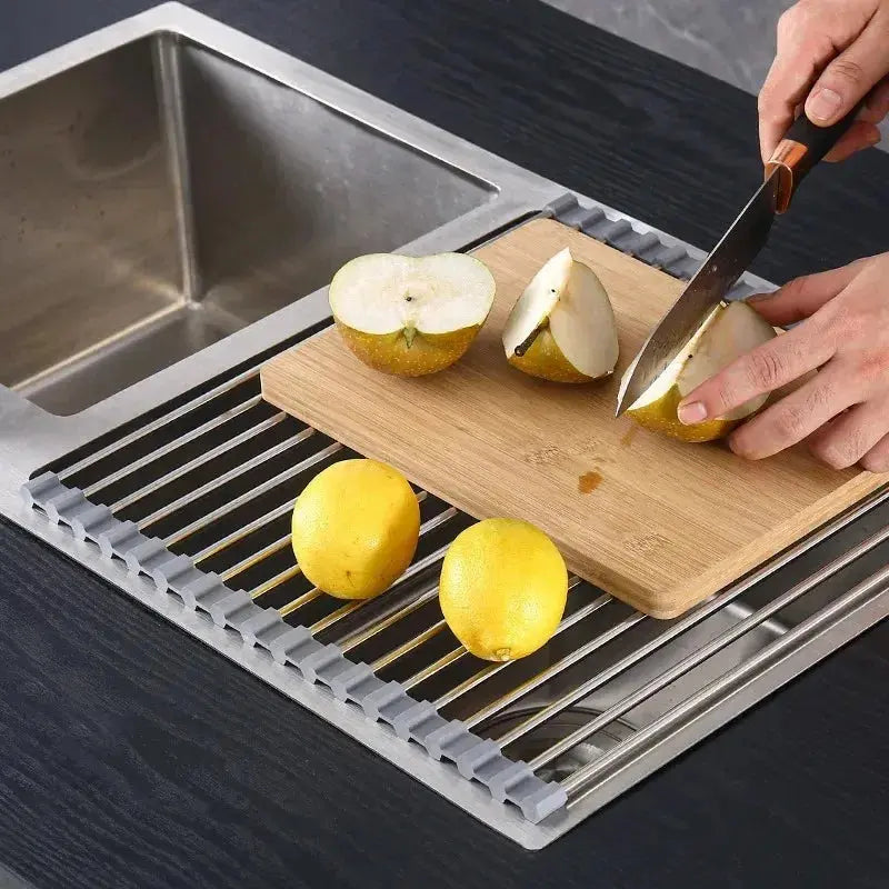 Roll-up dish drying rack over a kitchen sink