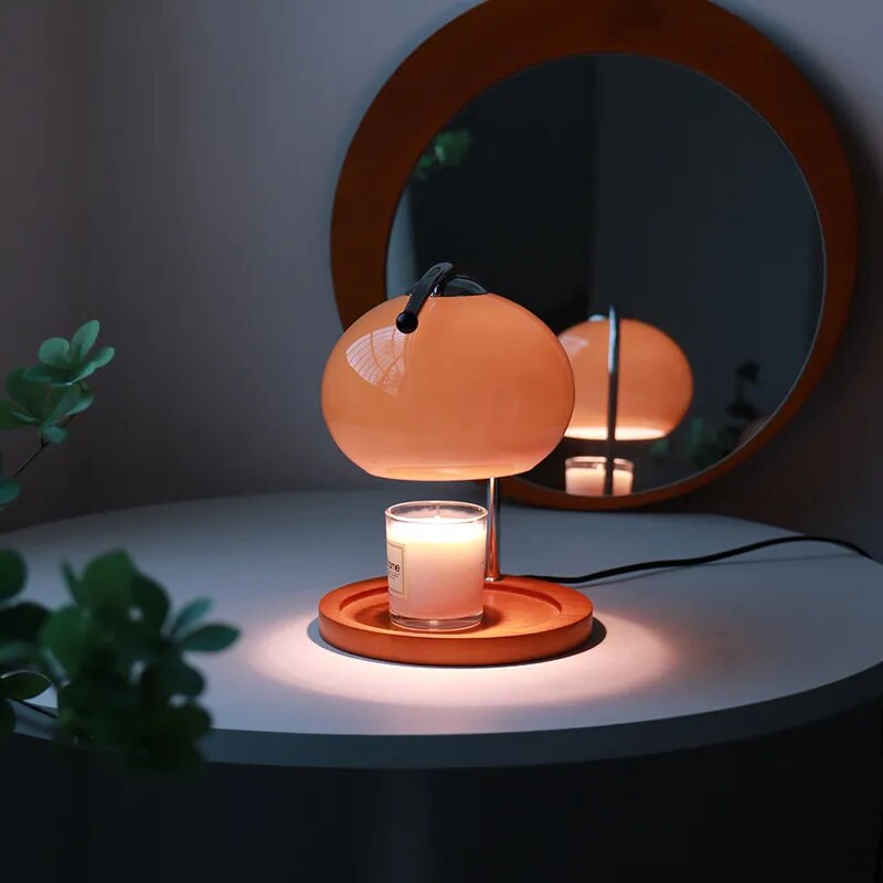 Candle warmer lamp melting a scented candle