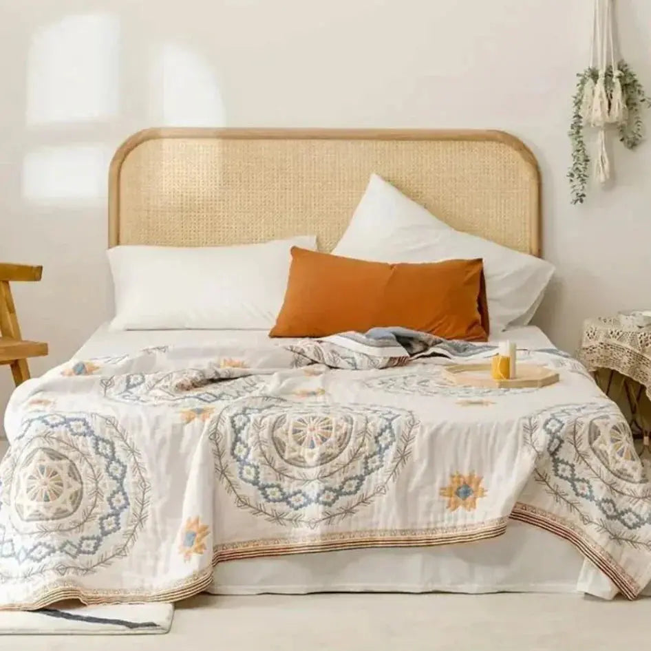 Boho bedspread draped on sofa