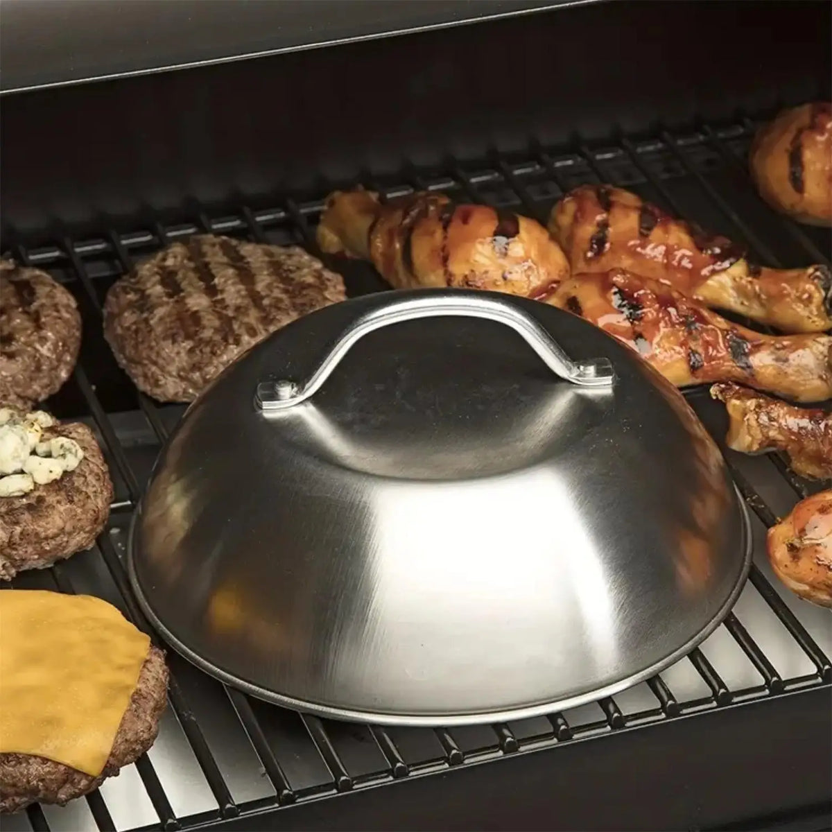 Burger with melted cheese under the dome