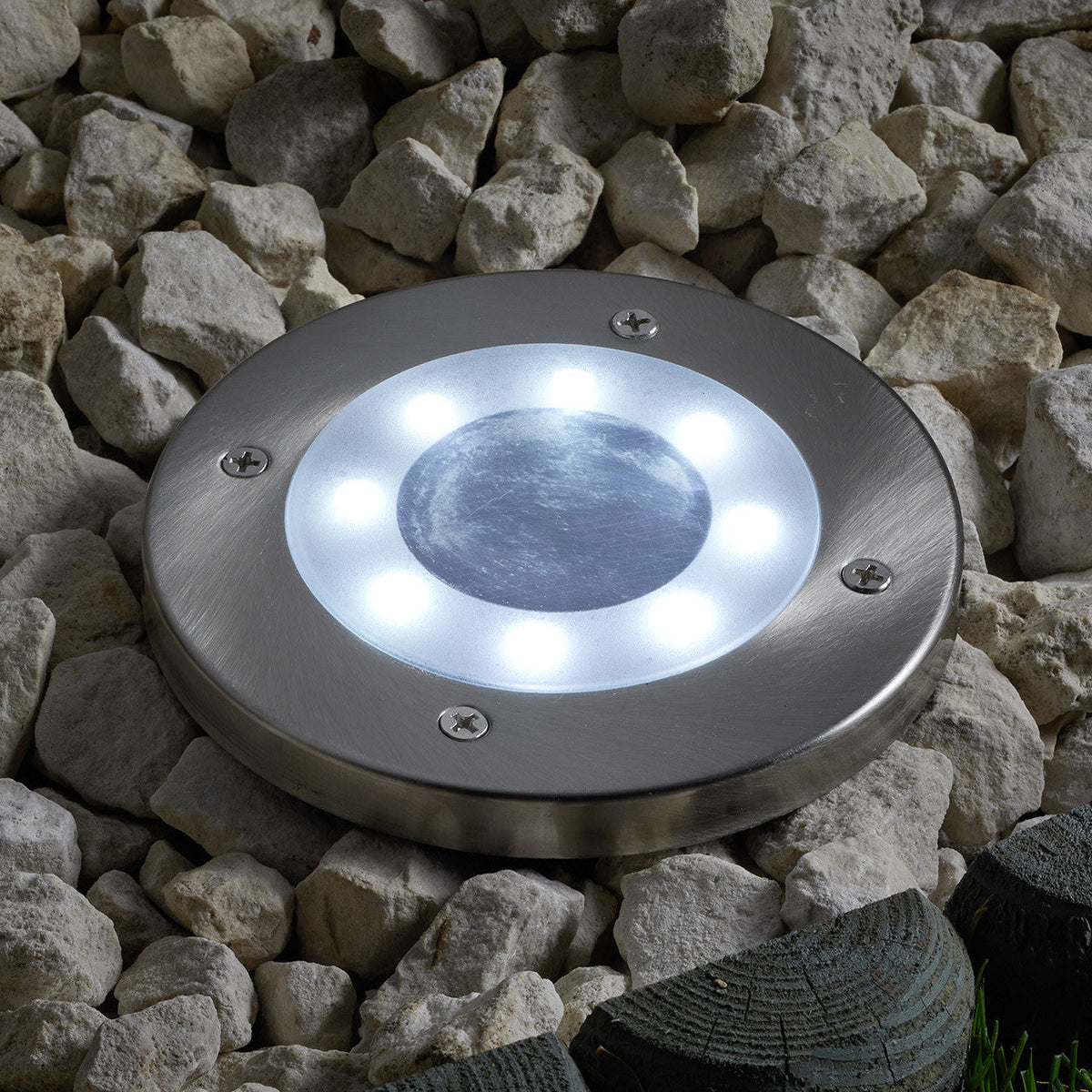 Solar ground lights lining a walkway