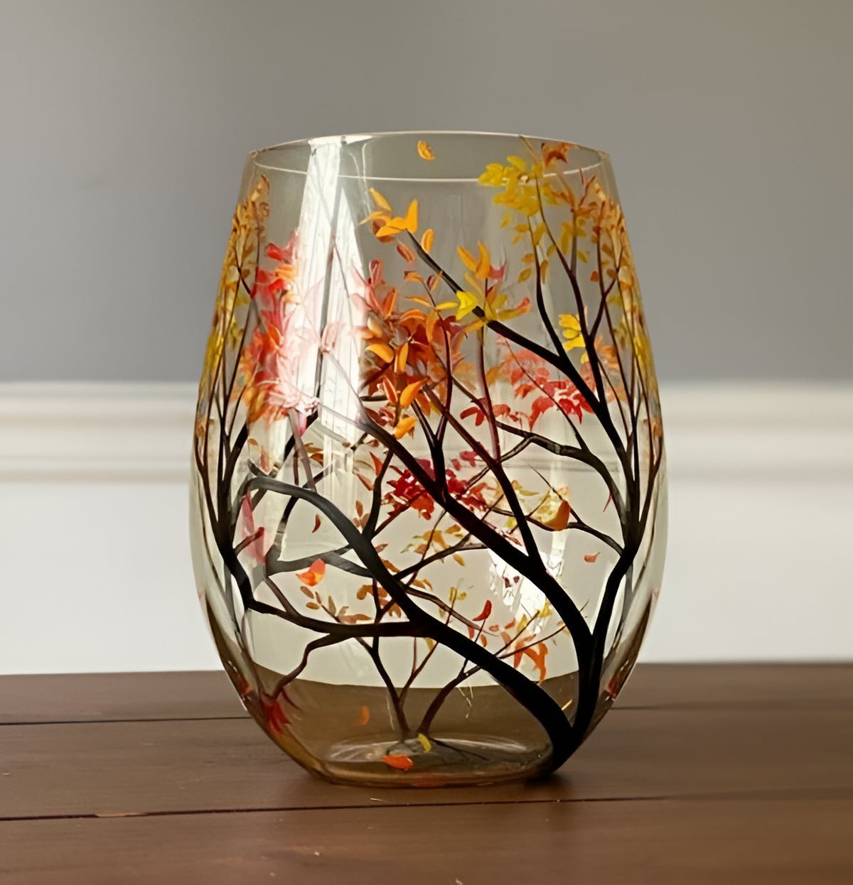 Stemless wine glass with autumn tree