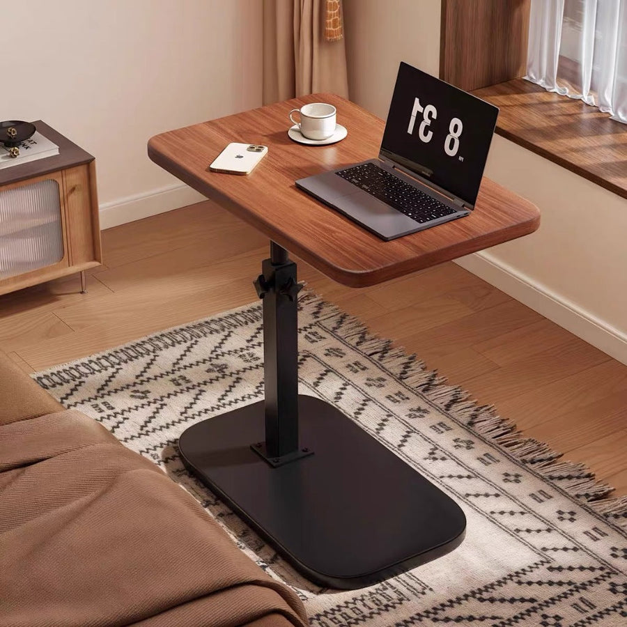 Height-adjustable side table beside sofa