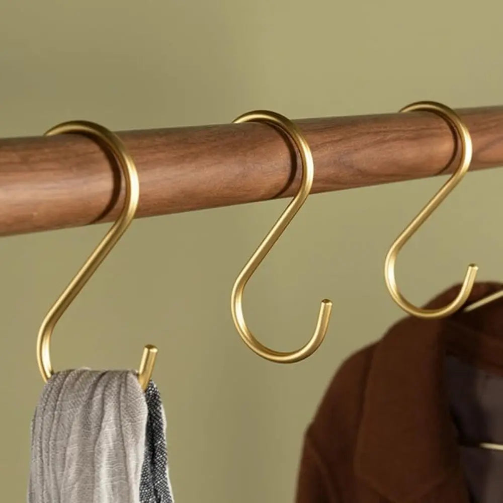 S-hooks holding kitchen utensils