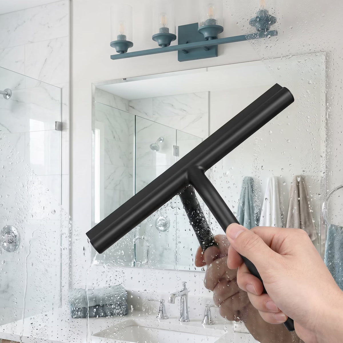 Shower squeegee hanging in bathroom