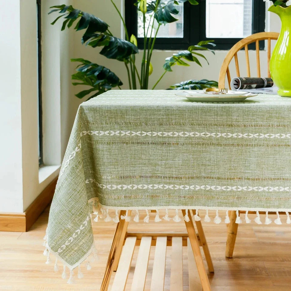 Farmhouse hemstitched tablecloth on a dining table