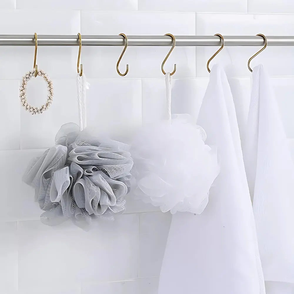 Aluminium S-hooks on a bathroom rail