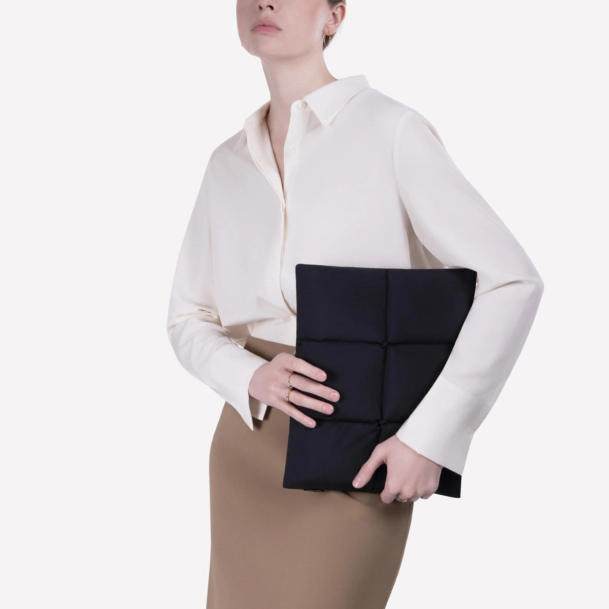 Puffy quilted laptop sleeve with laptop