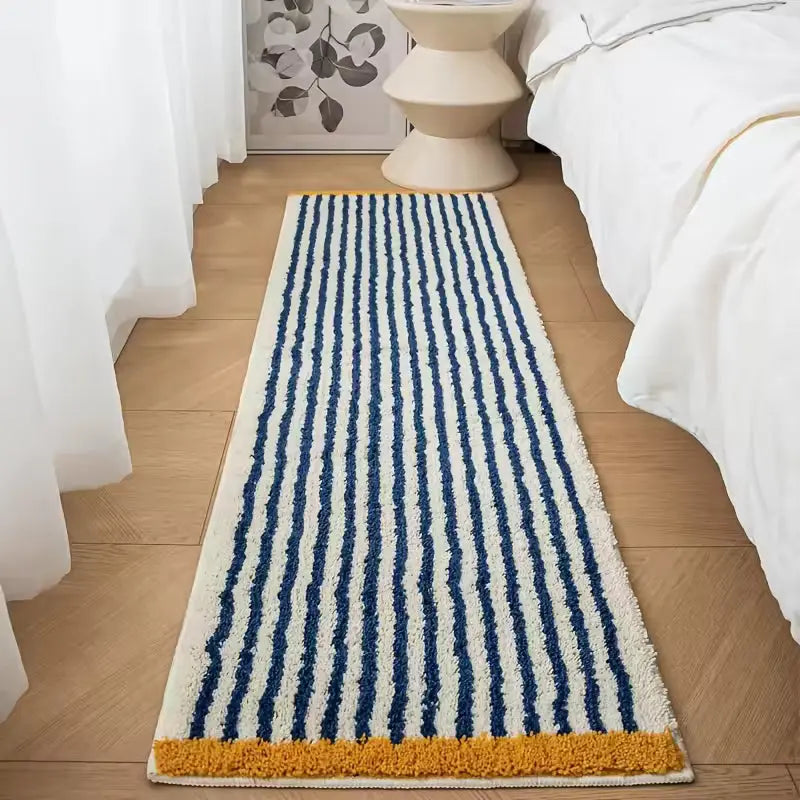 Geometric bath mat in Navy Stripe