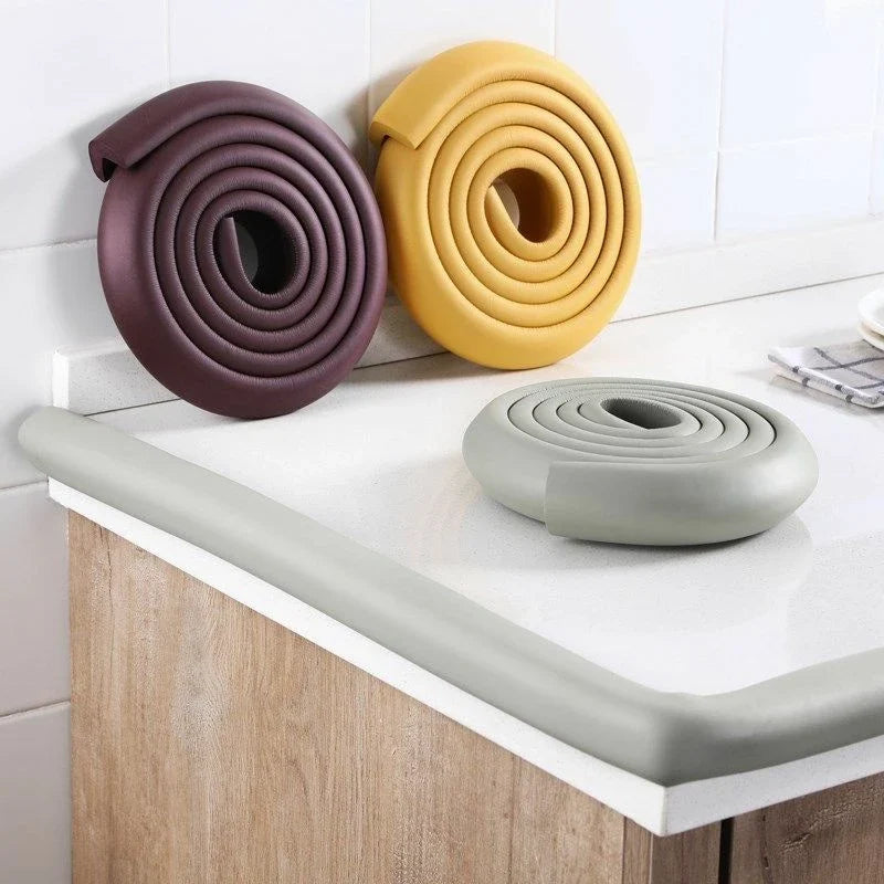 Soft foam edge guard strip on a table corner