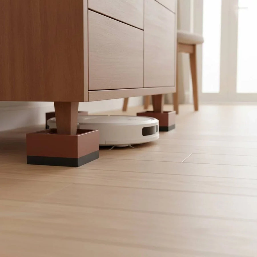 Furniture riser pads under a sofa leg