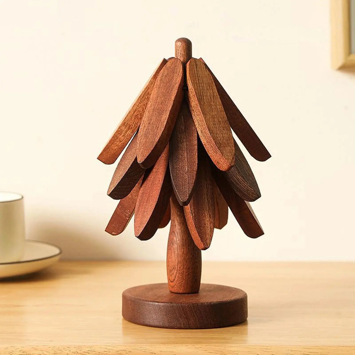 Tree-shaped wooden trivets in walnut brown