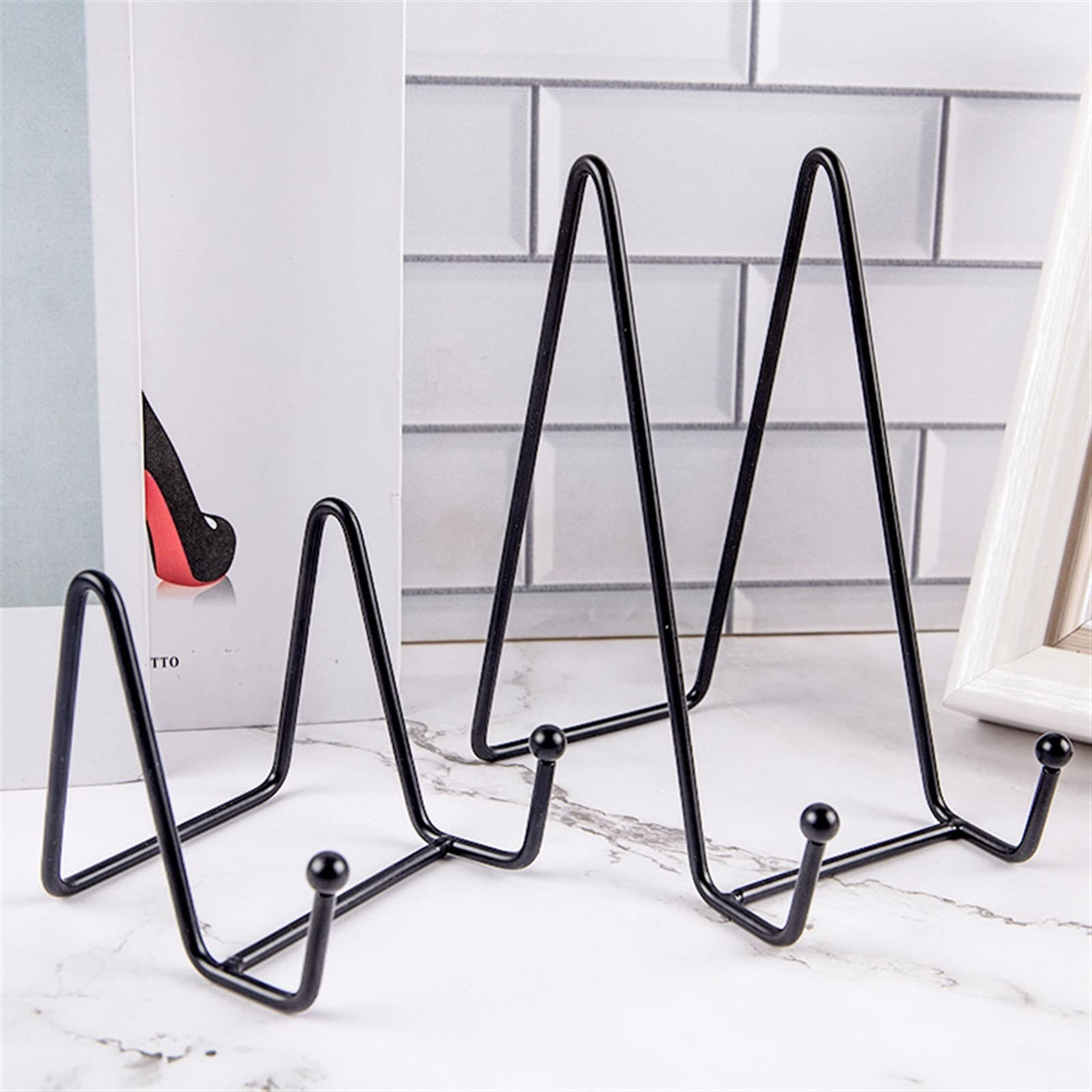 Iron easel stand styled on a countertop