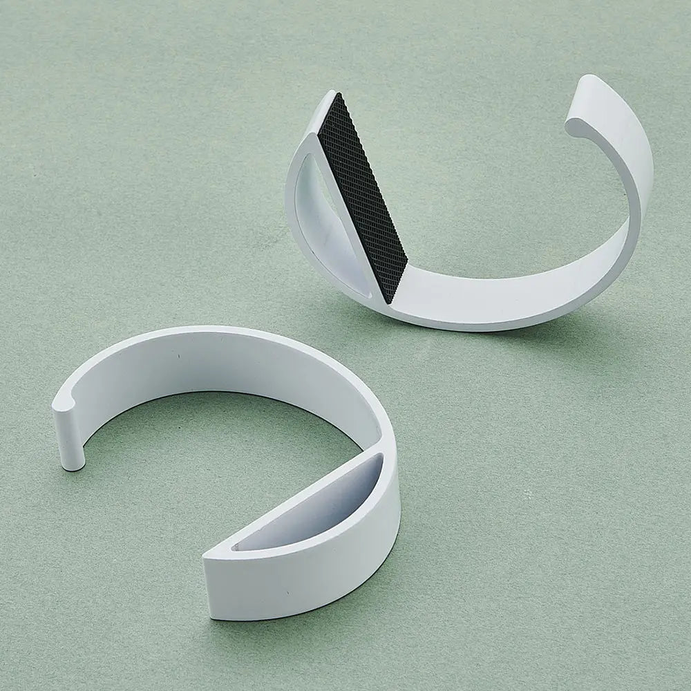 Portable bag hook in use at a desk