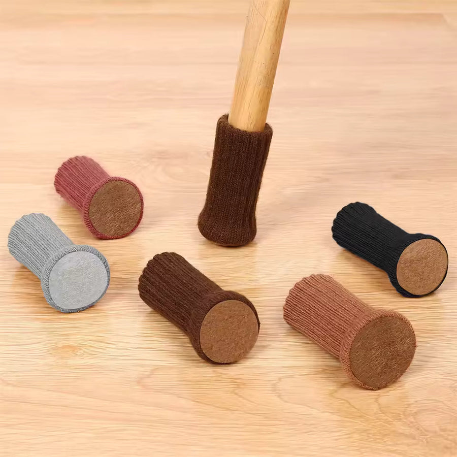 Knitted chair leg socks on dining chairs